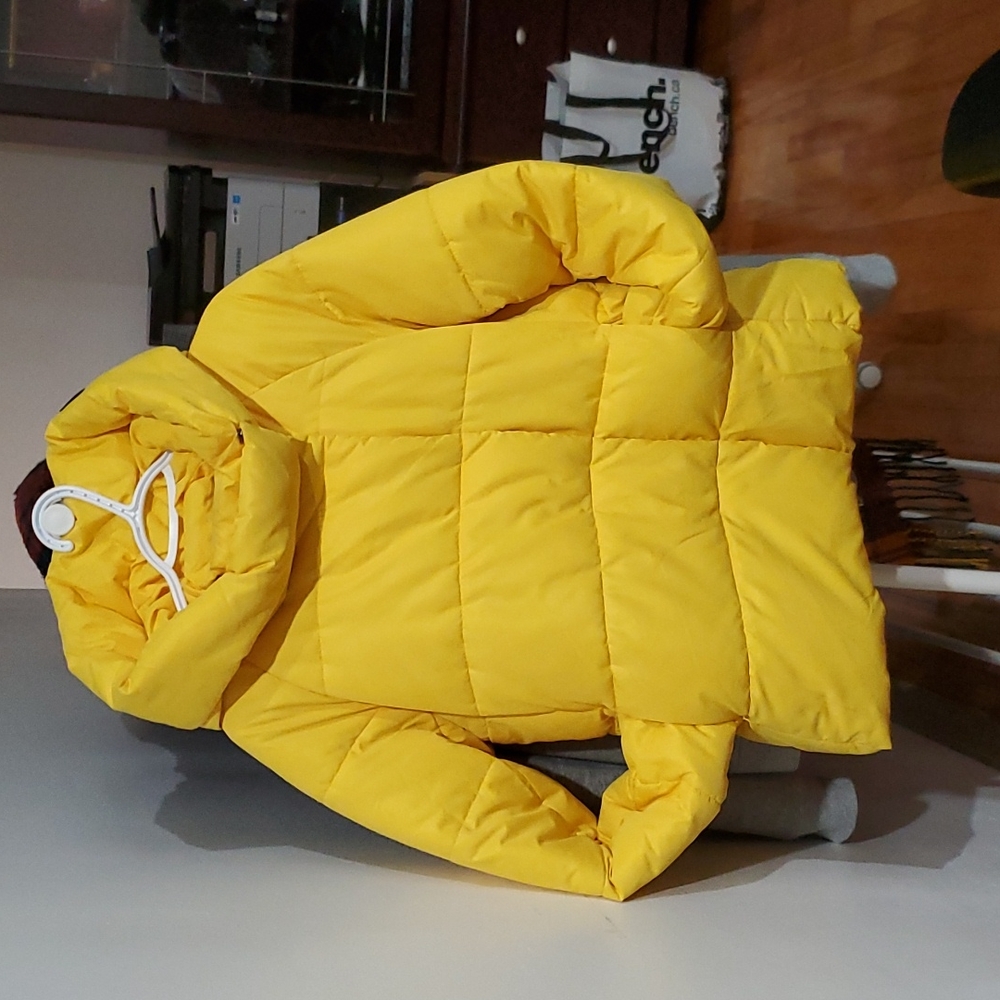Yellowed puffer jacket